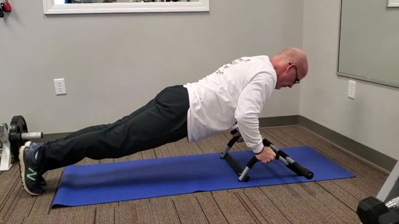 Dave Durell from Strength After 50 .com performing push-ups.