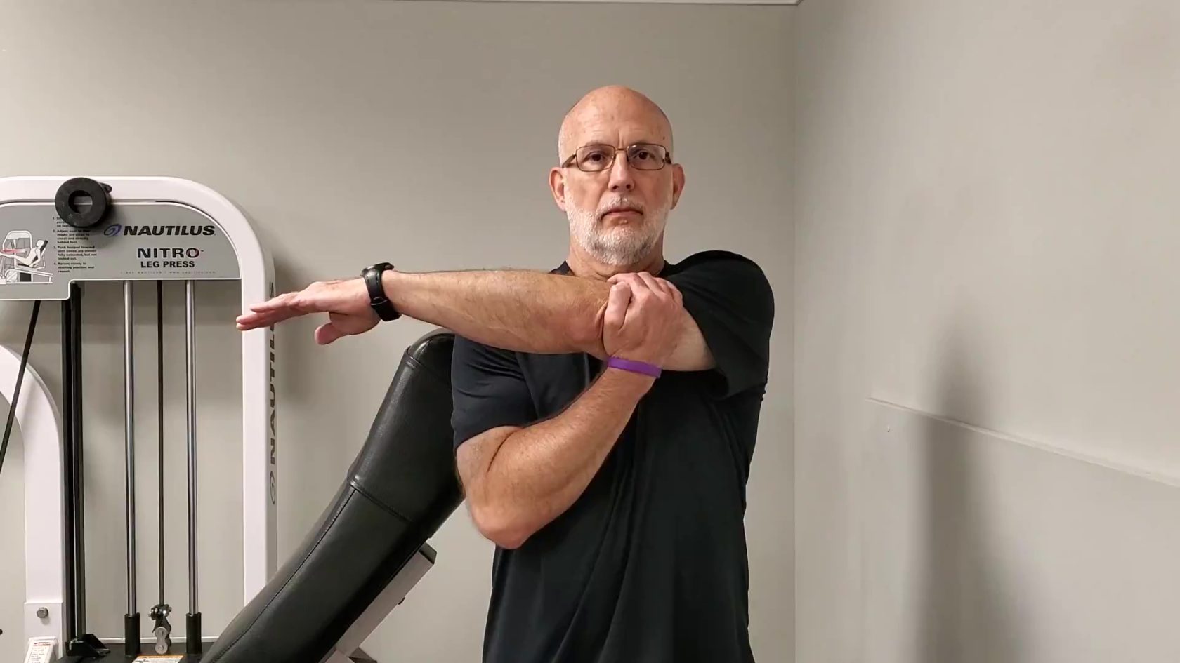 Over 50 Fitness - Dave Durell from Strength After 50 demonstrates a shoulder stretch.